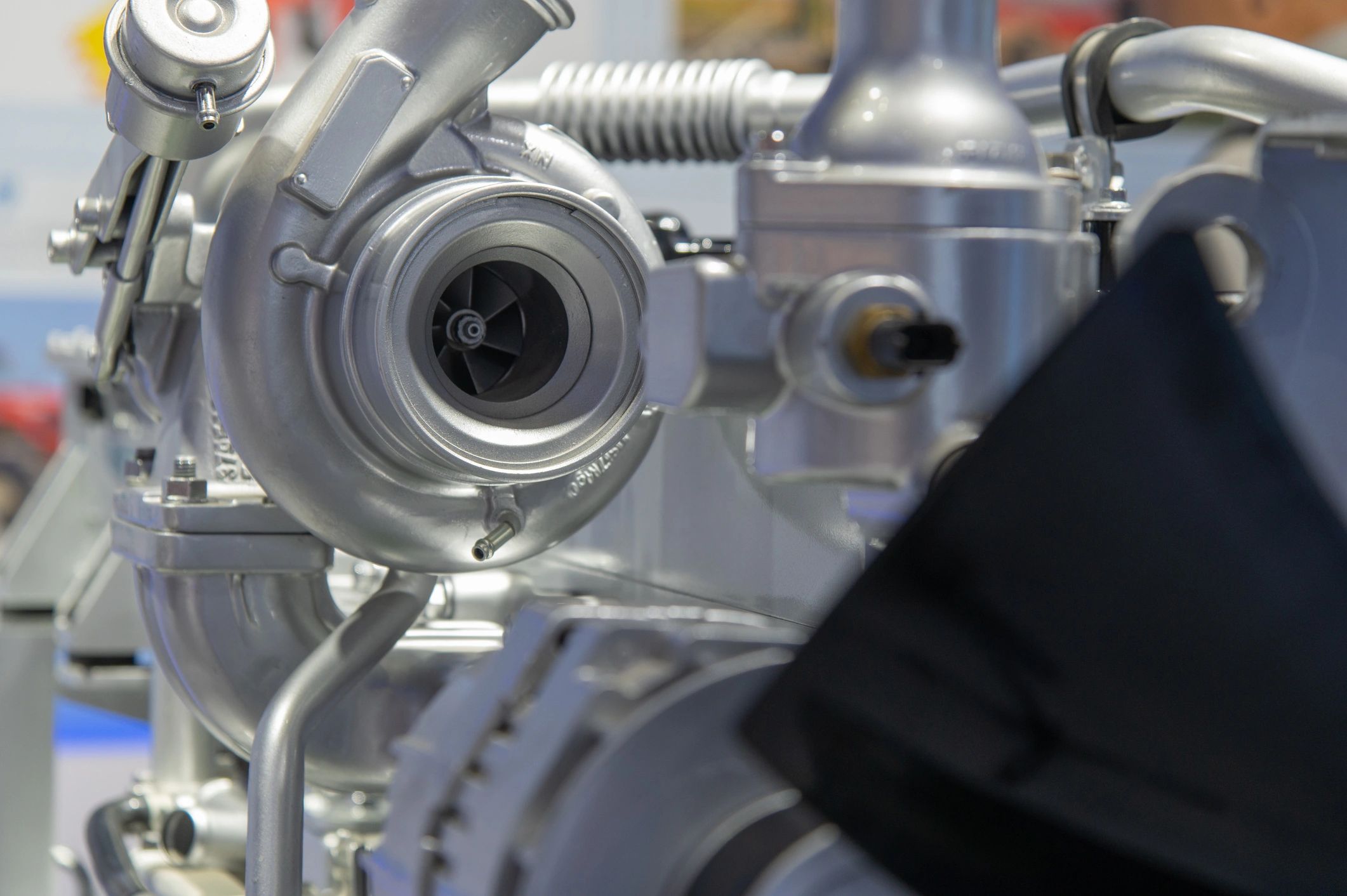 Close-up of a turbocharger assembly for heavy equipment